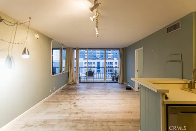 a big room with windows and closet