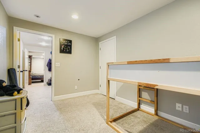 a view of a hallway with workspace