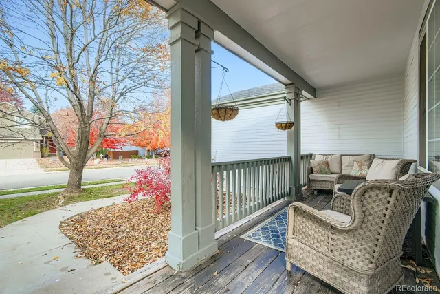a view of balcony with furniture