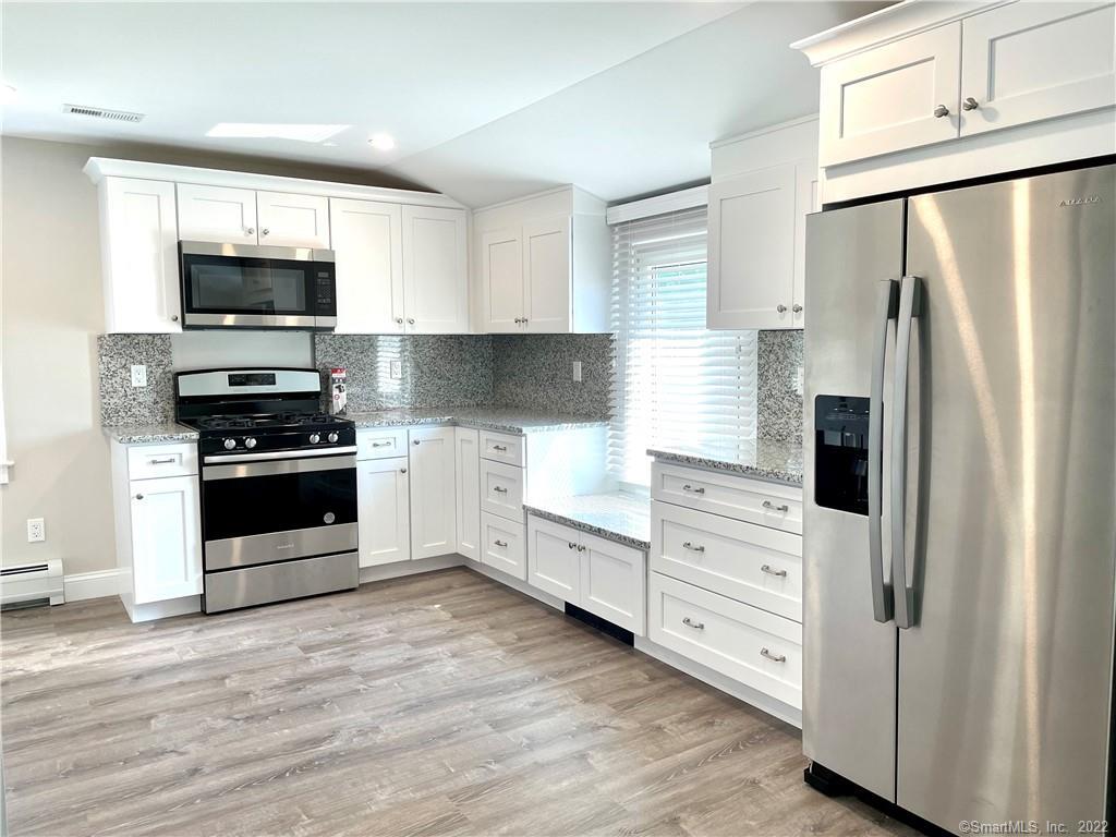 31 Ledge Avenue, Unit 2 New Canaan, CT 06840 - Photo 2 of 14 Nicely Updated