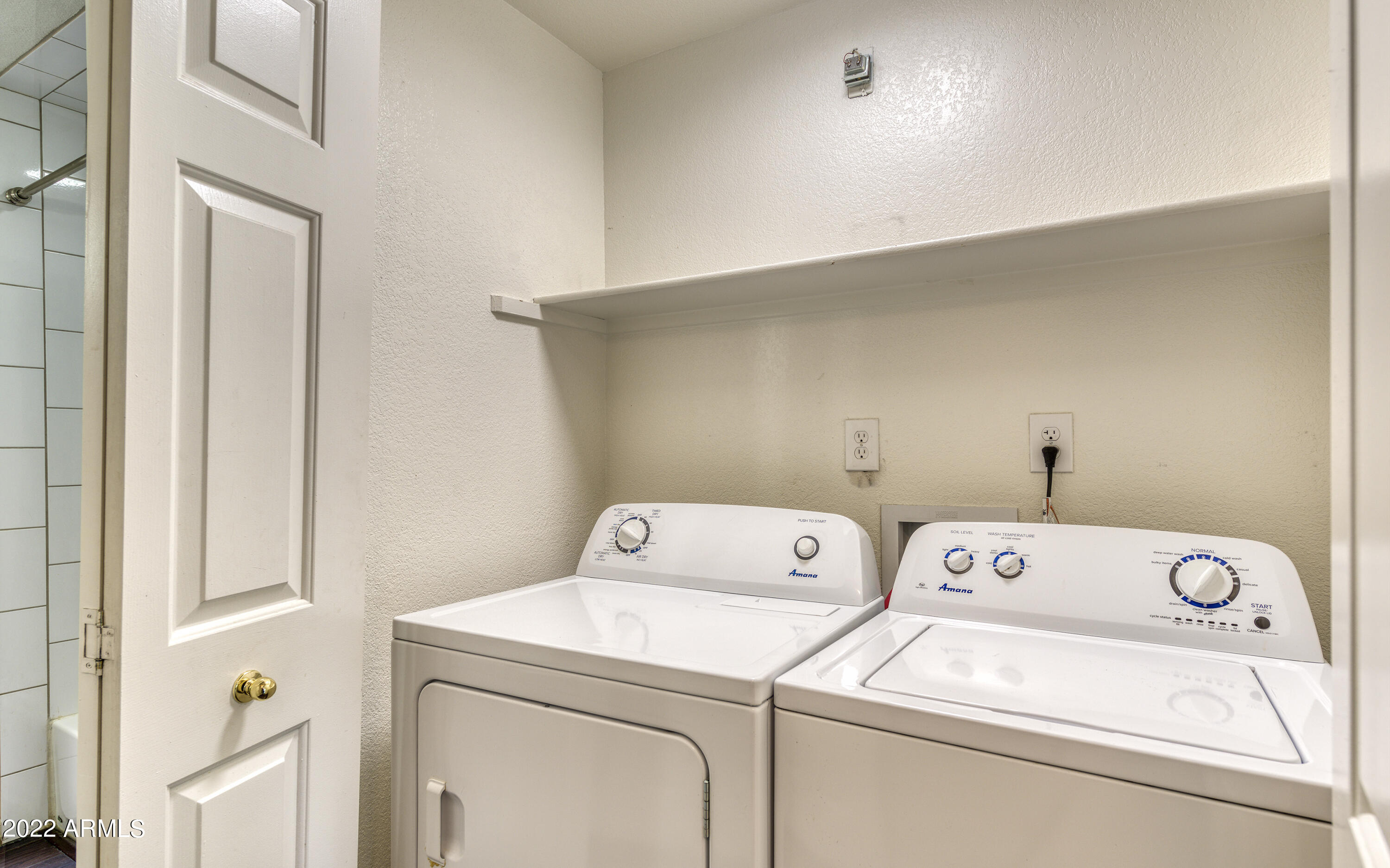 100 East Fillmore Street, Unit 201 Phoenix, AZ 85004 - Photo 18 of 23 a utility room with dryer and washer