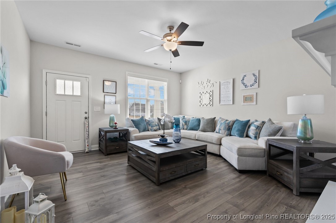 1660 Stackhouse Drive Fayetteville, NC 28314 - Photo 11 of 44 a living room with furniture a table and a window