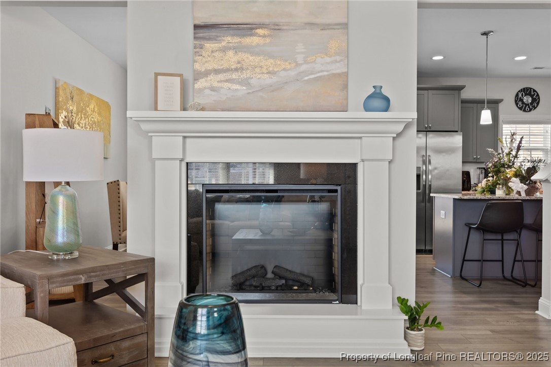 1660 Stackhouse Drive Fayetteville, NC 28314 - Photo 12 of 44 a living room with furniture and a fireplace