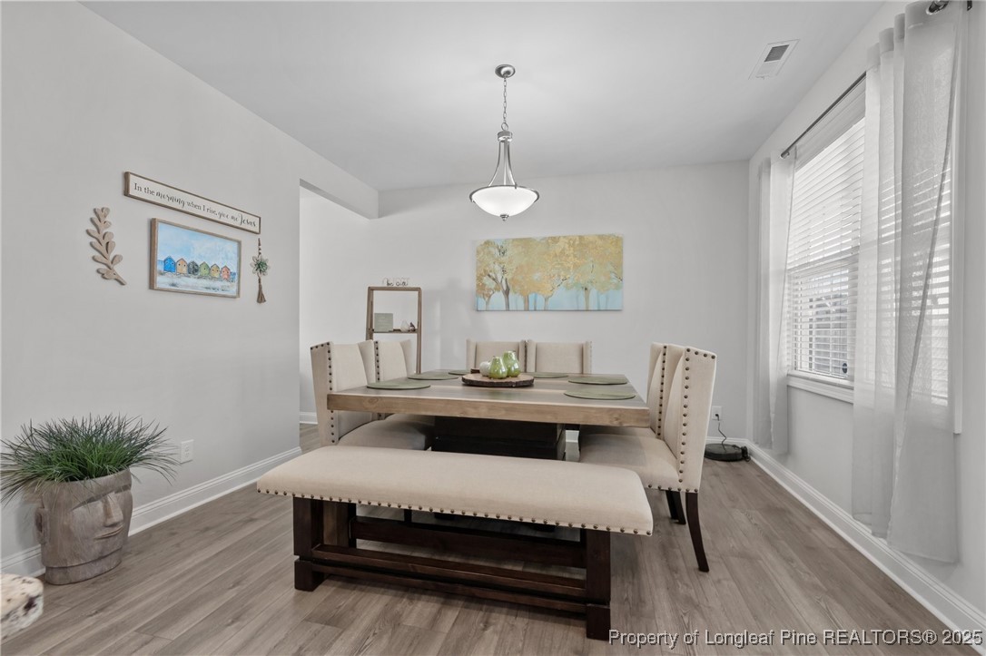 1660 Stackhouse Drive Fayetteville, NC 28314 - Photo 19 of 44 a living room with furniture and a table