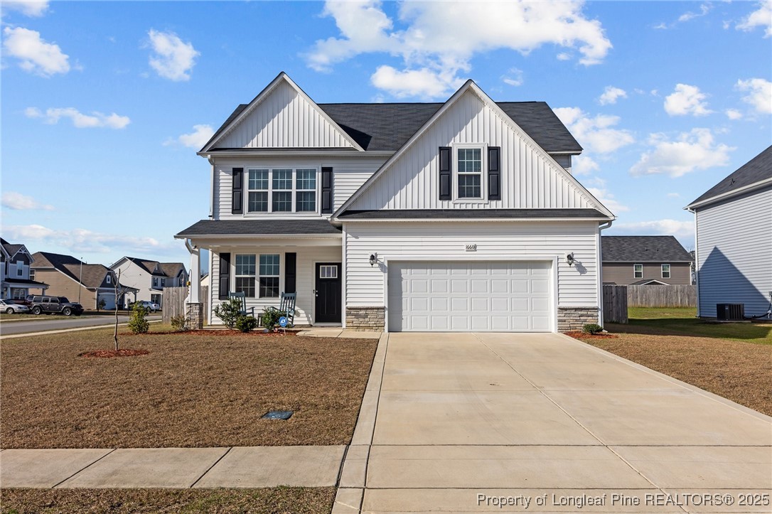 1660 Stackhouse Drive Fayetteville, NC 28314 - Photo 2 of 44 a front view of a house with yard and parking