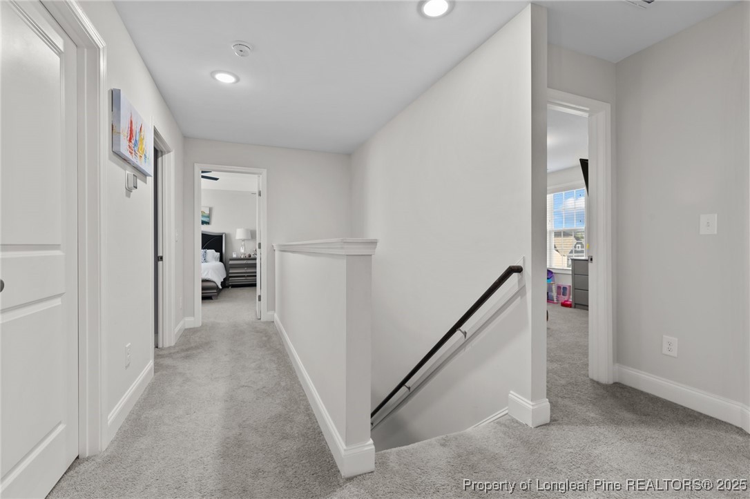 1660 Stackhouse Drive Fayetteville, NC 28314 - Photo 22 of 44 a view of a hallway view with staircase
