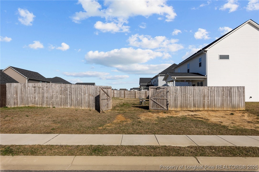 1660 Stackhouse Drive Fayetteville, NC 28314 - Photo 39 of 44 a view of a backyard of the house