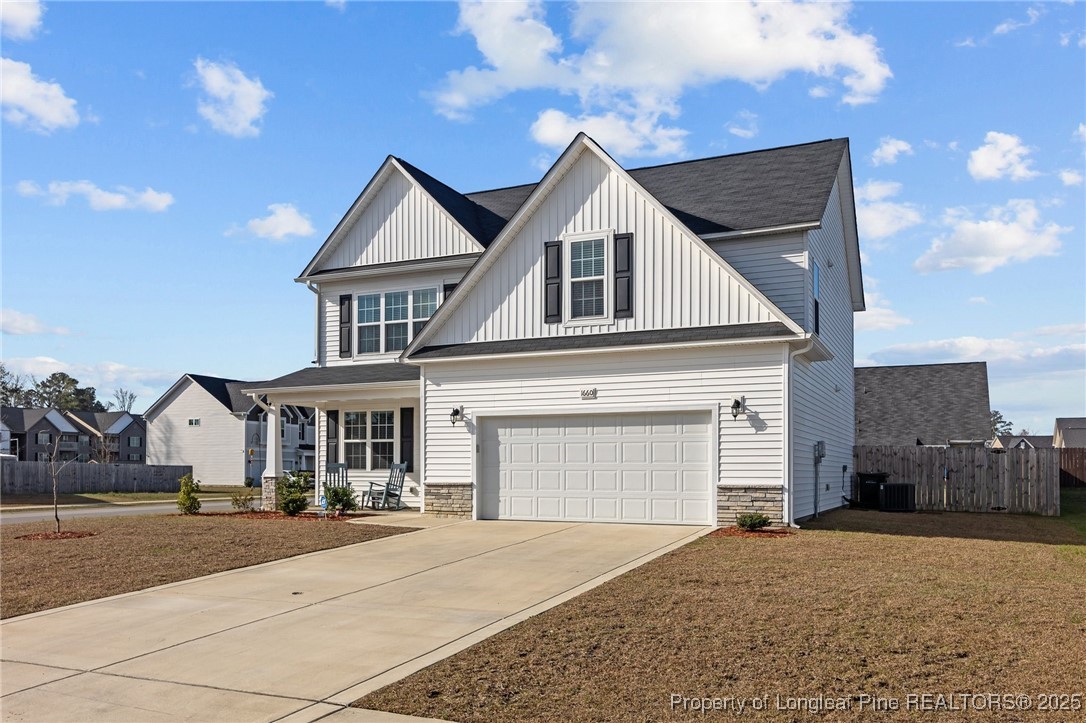 1660 Stackhouse Drive Fayetteville, NC 28314 - Photo 4 of 44 a front view of a house with yard and parking