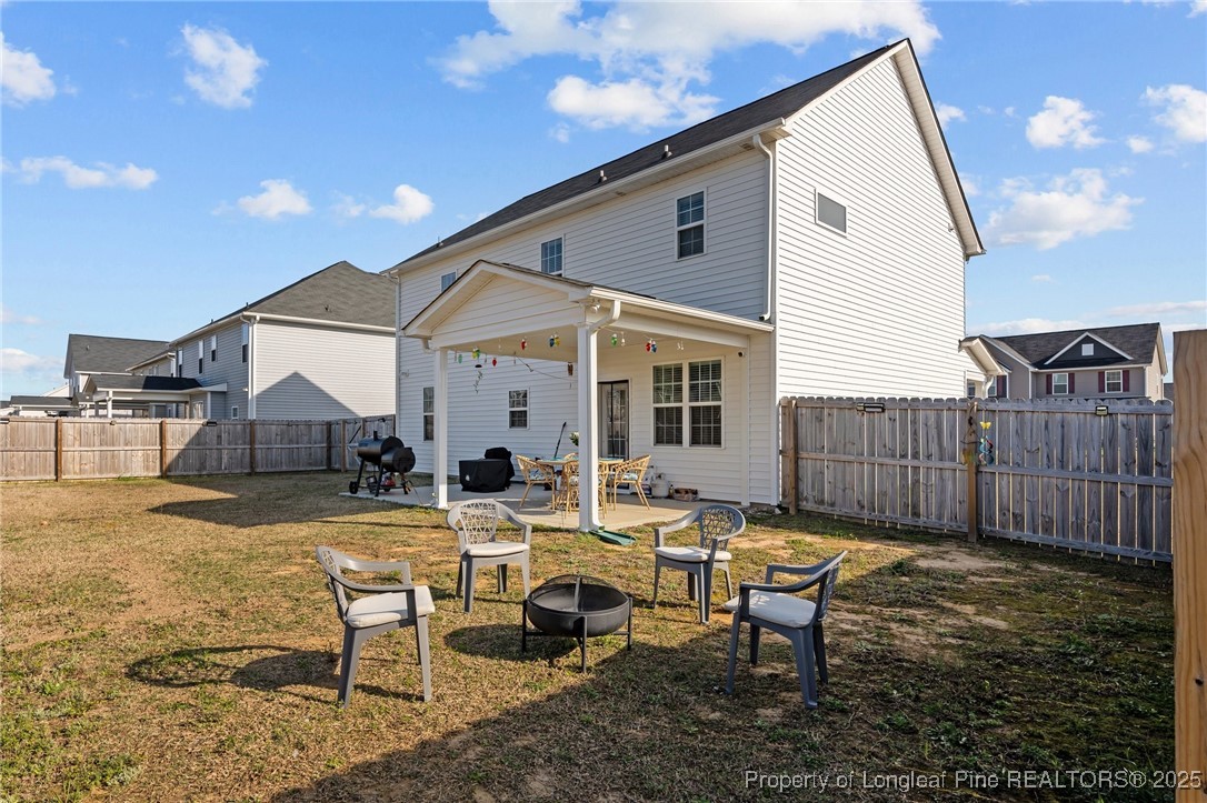 1660 Stackhouse Drive Fayetteville, NC 28314 - Photo 42 of 44 a view of a house with backyard and sitting area