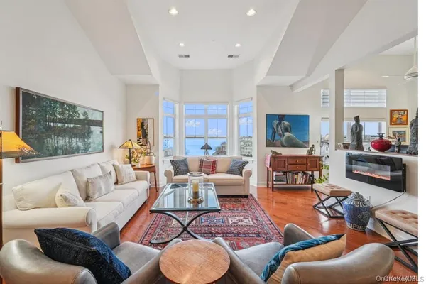 a living room with furniture or couch and a flat screen tv