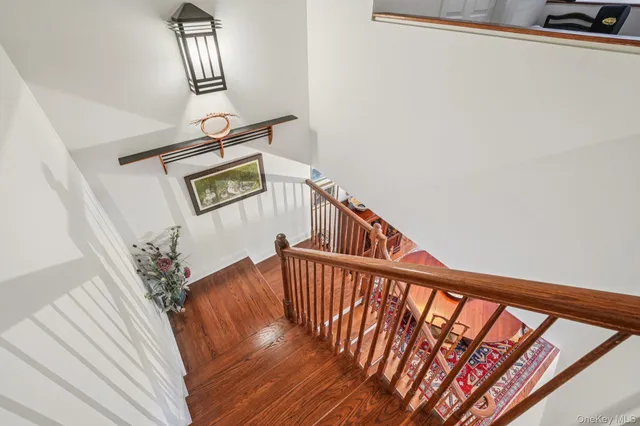a view of entryway with wooden floor