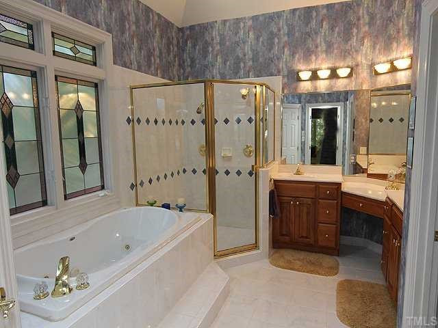 3824 White Chapel Way Raleigh, NC 27615 - Photo 14 of 25 Relax in this gorgeous master bath with a jetted garden tub and a separate shower. Master Bath/Spa
