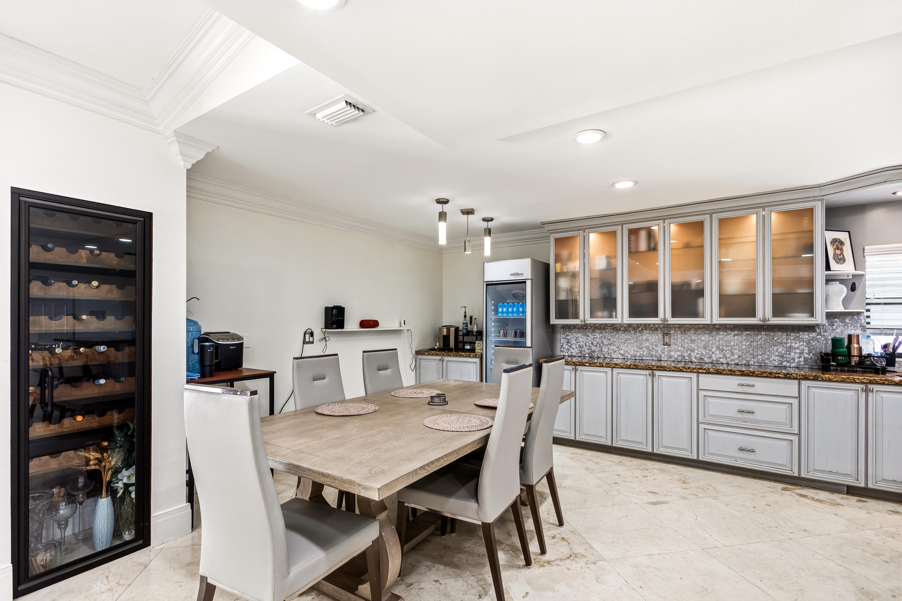 5223 Deerhurst Crescent Circle Boca Raton, FL 33486 - Photo 29 of 51 a view of a dining room with furniture window and wooden floor
