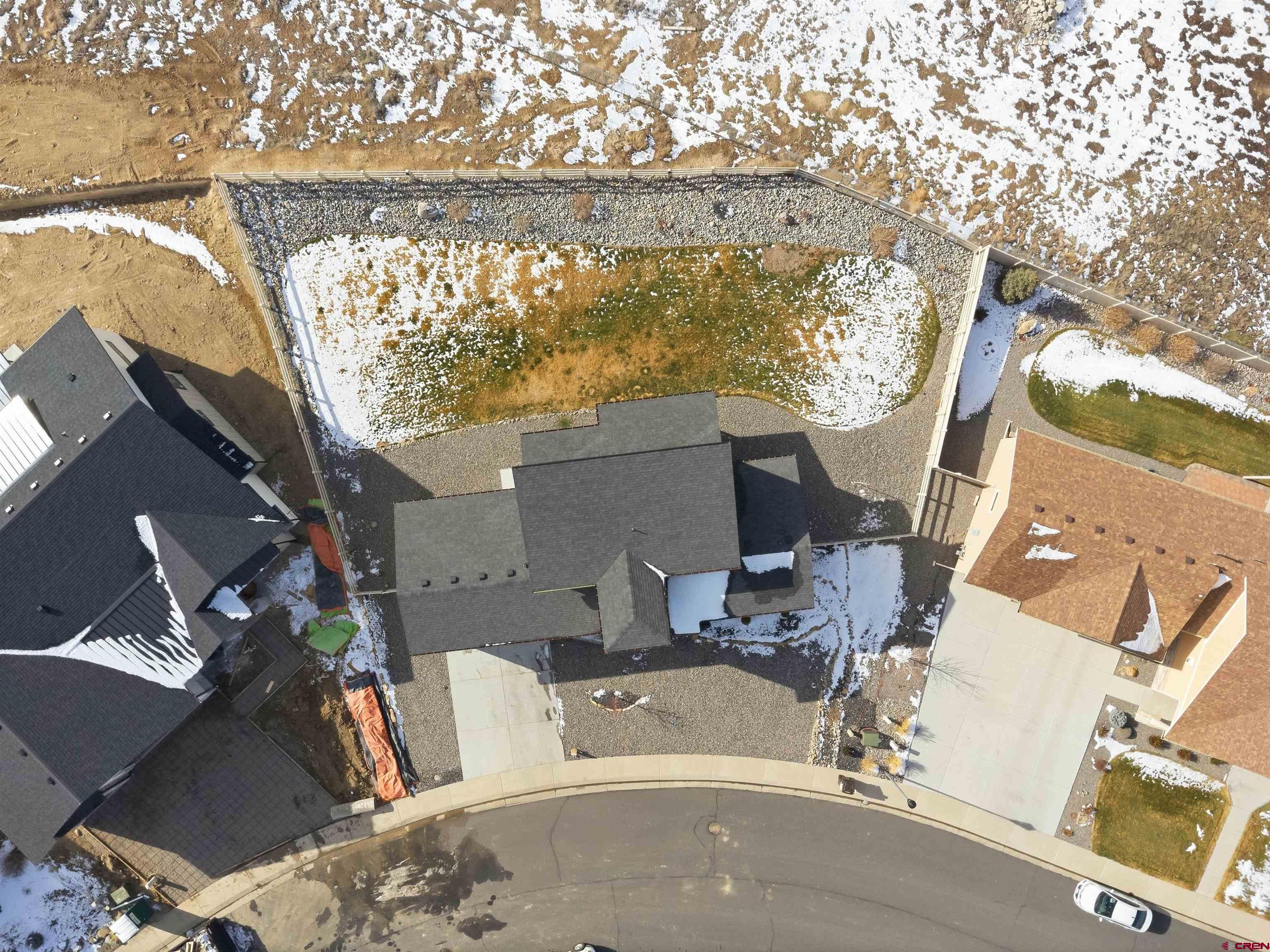 3614 Ridgeline Drive Montrose, CO 81401 - Photo 3 of 45 an aerial view of a house with a yard