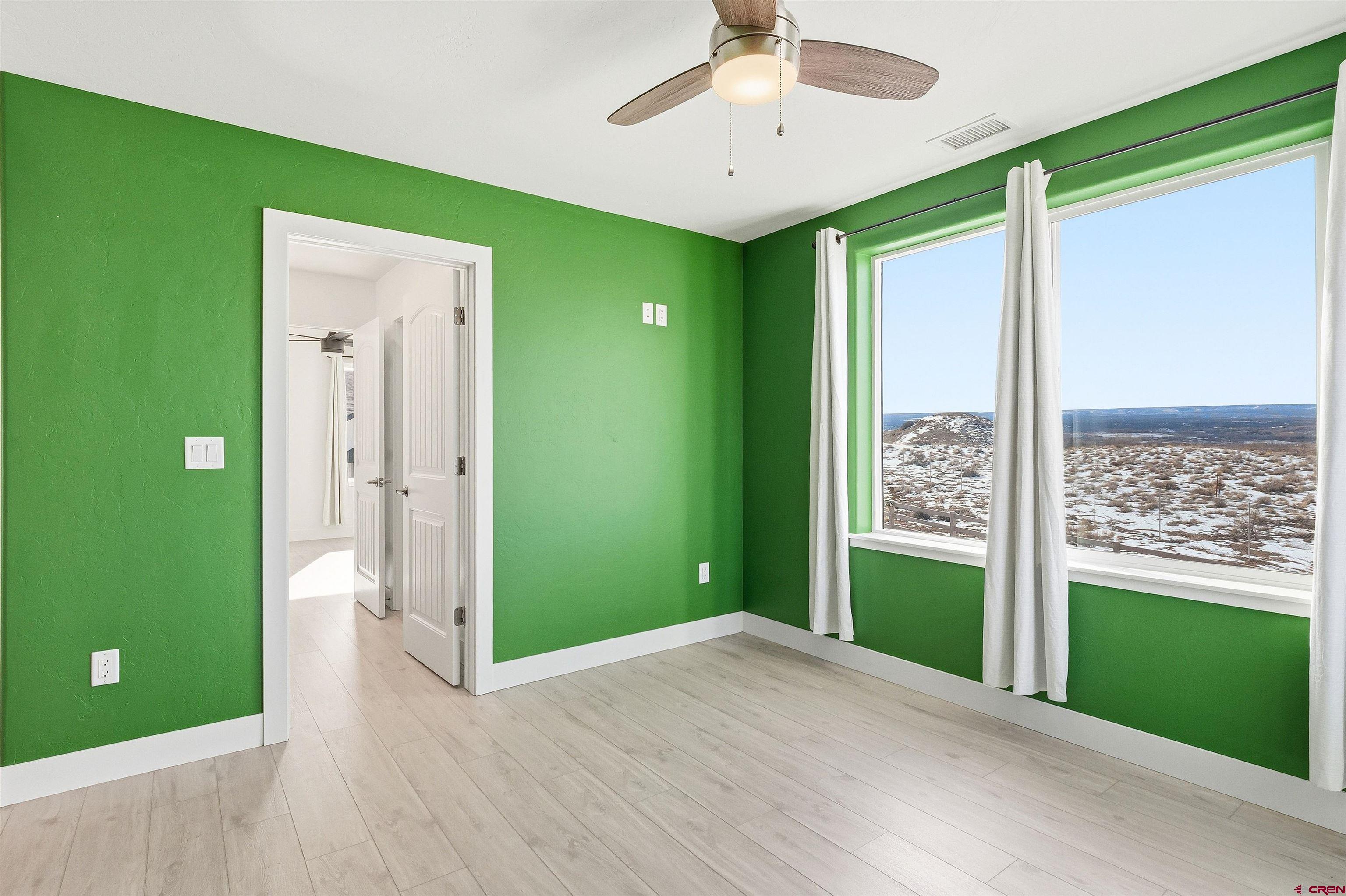 3614 Ridgeline Drive Montrose, CO 81401 - Photo 33 of 45 a view interior of a house and an empty room with a window