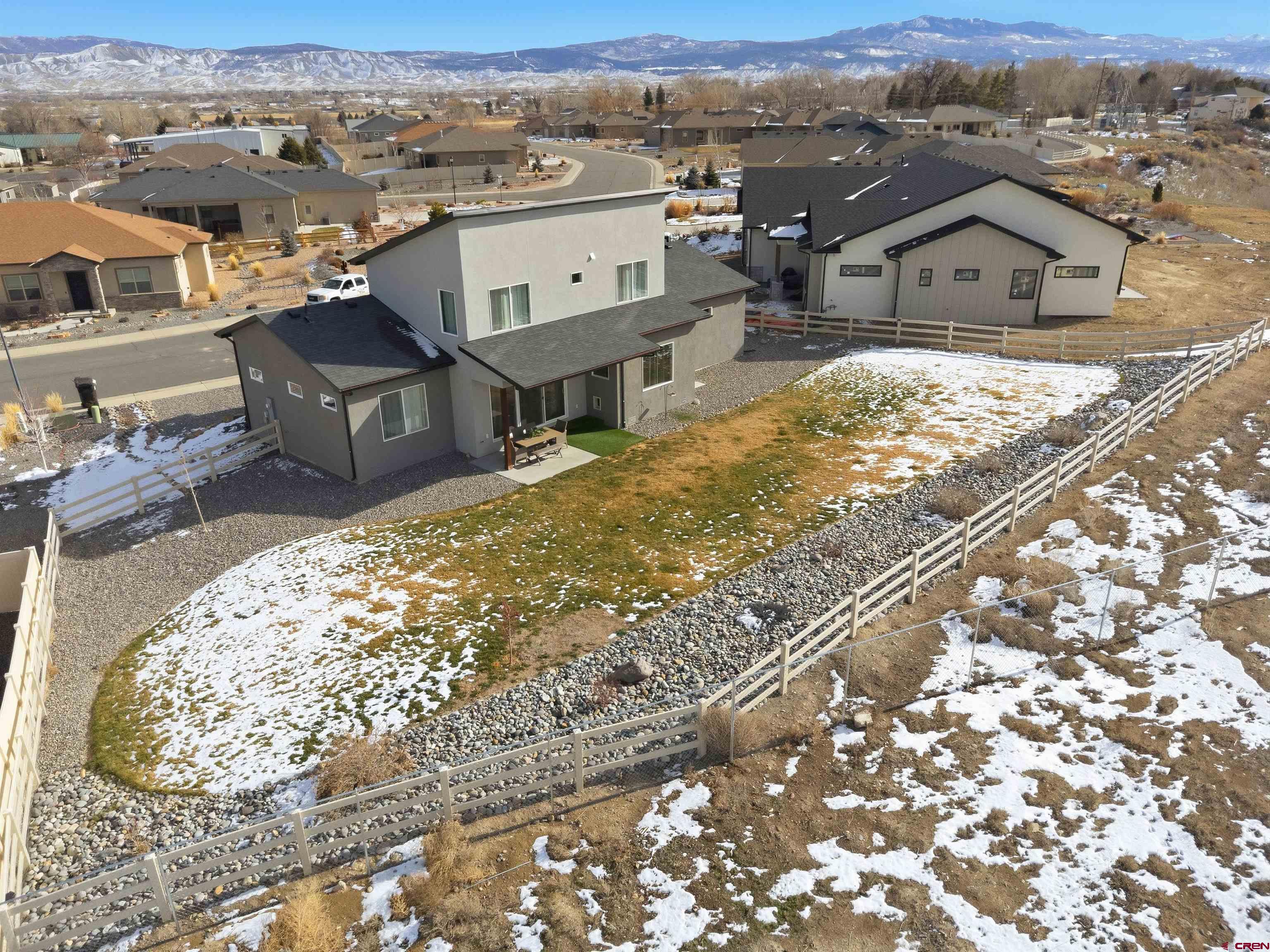 3614 Ridgeline Drive Montrose, CO 81401 - Photo 42 of 45 an aerial view of a house with a mountain view