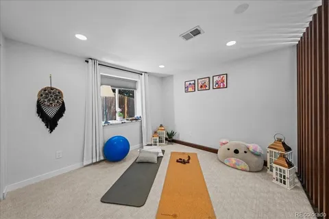 a bedroom with bed and window