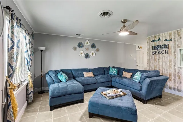 a living room with furniture and a couch