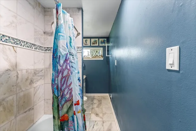 a very nice looking room with a bathroom