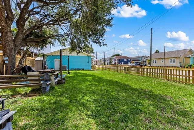 a view of a patio with chair table and chairs