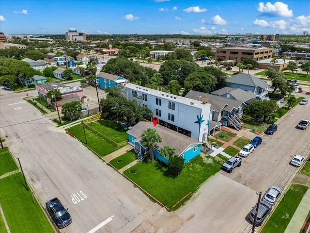 an aerial view of a house with a garden