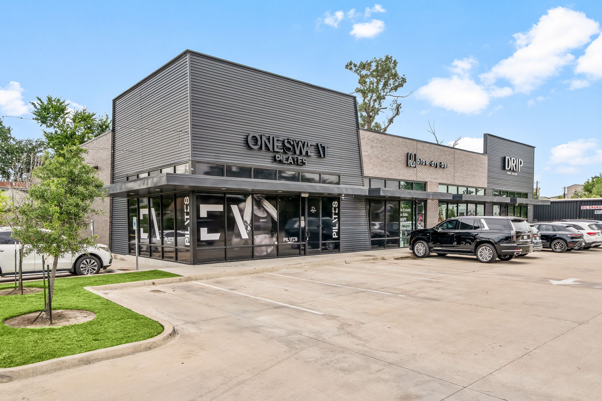 2609 Bevis Street Houston, TX 77008 - Photo 23 of 28 a view of a building with a patio and a yard