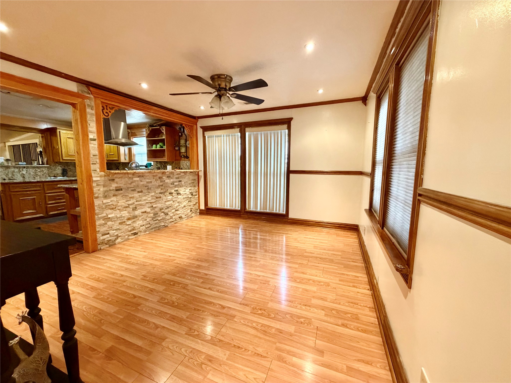 2609 Bevis Street Houston, TX 77008 - Photo 5 of 28 a view of an empty room with wooden floor and a window