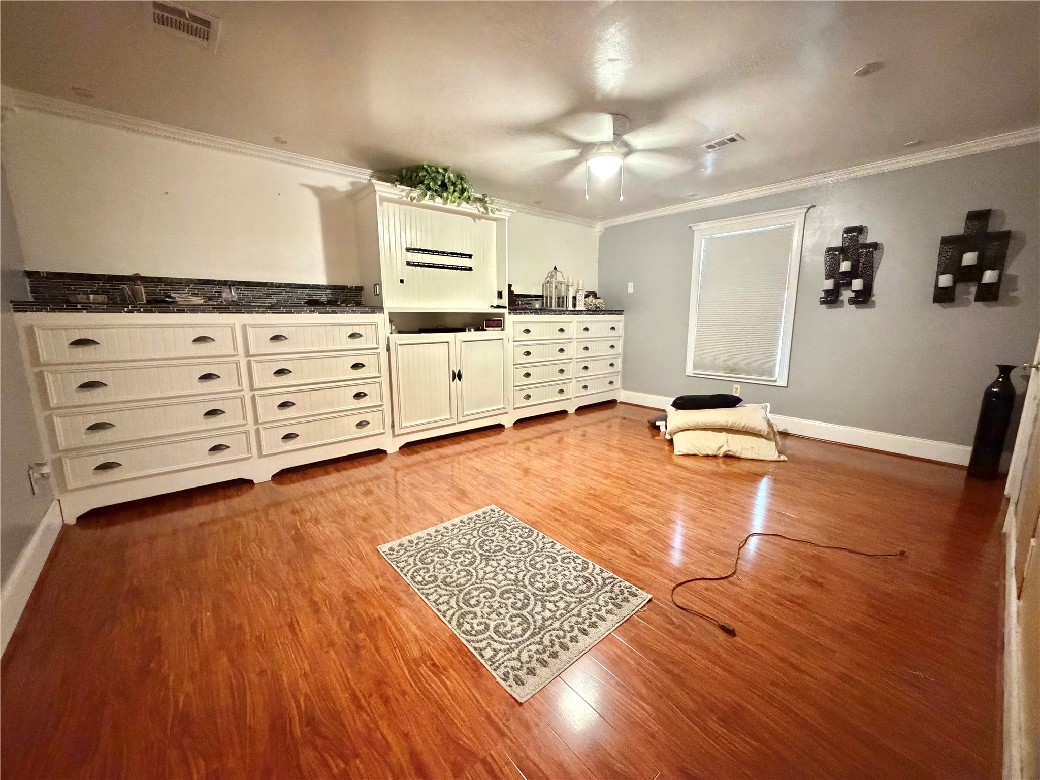 2609 Bevis Street Houston, TX 77008 - Photo 9 of 28 a room with furniture and view of closet
