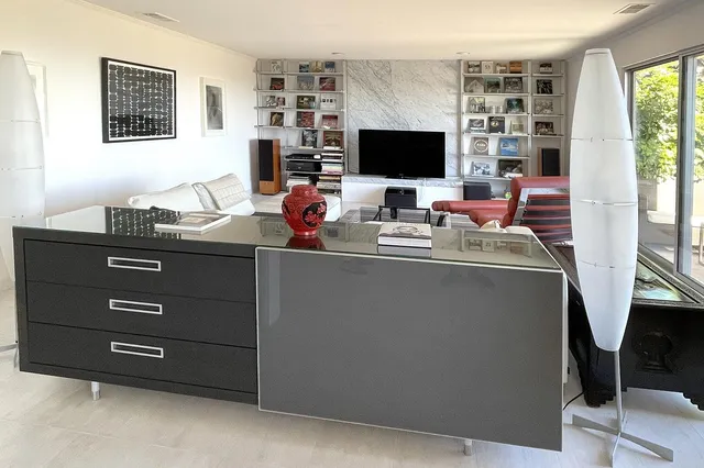 a view of a workspace with furniture