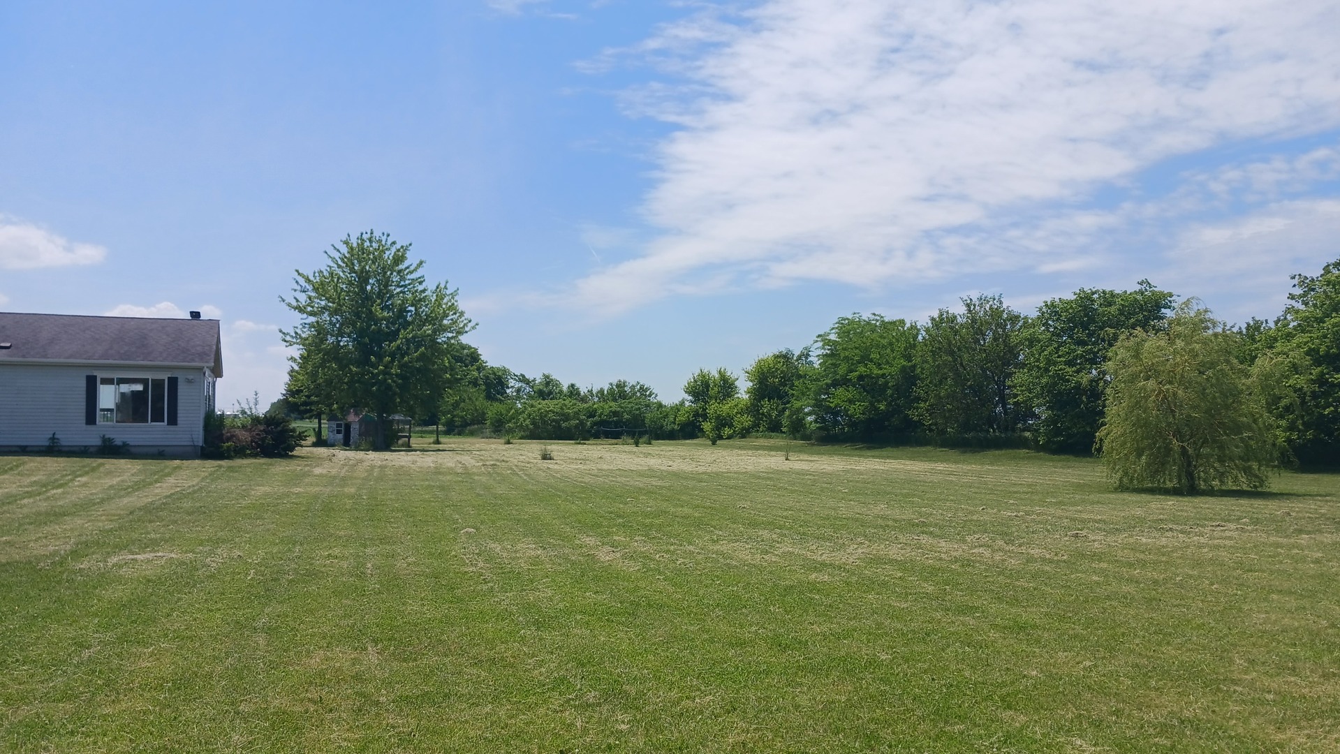 4775 East Grinter Road Gardner, IL 60424 - Photo 3 of 15 a view of big yard with a house