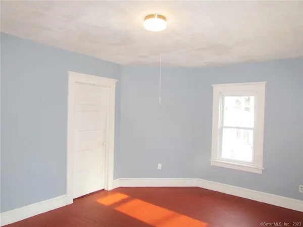 an empty room with a window