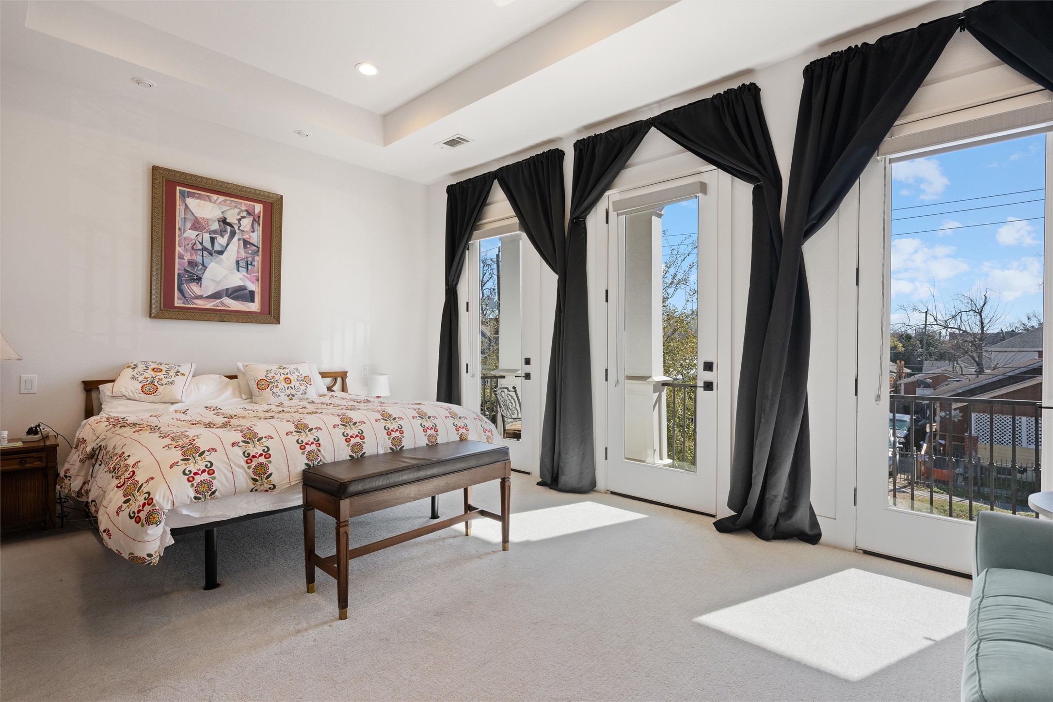 1136 Adele Street Houston, TX 77009 - Photo 16 of 28 a bed sitting in a bedroom next to a window