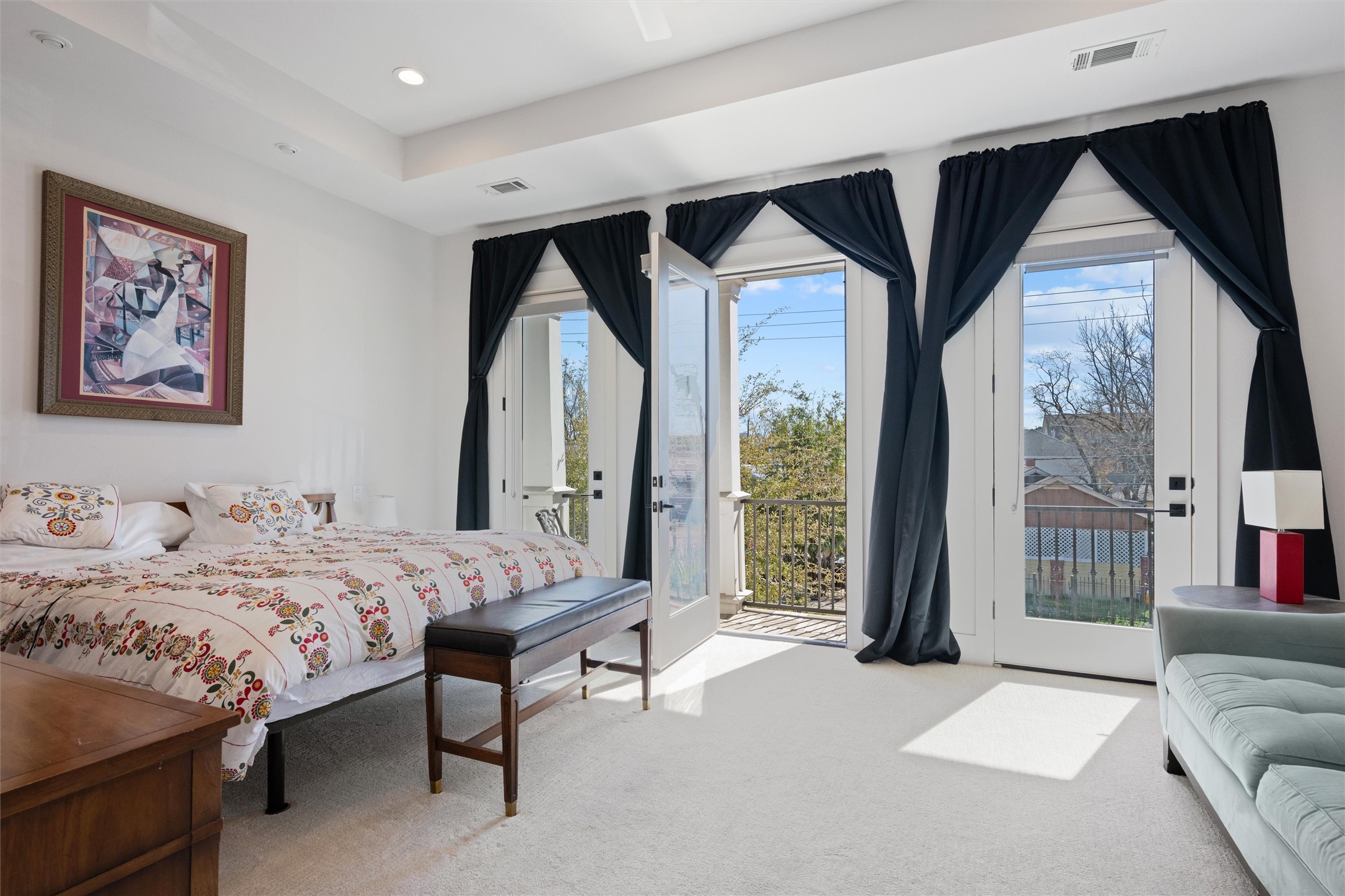 1136 Adele Street Houston, TX 77009 - Photo 18 of 28 a bedroom with a bed and a large window