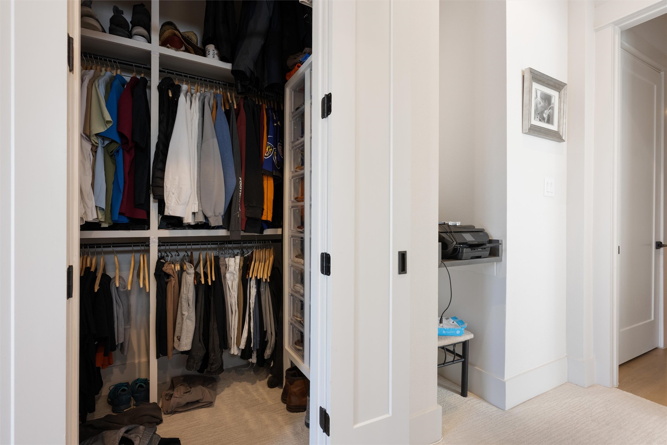 1136 Adele Street Houston, TX 77009 - Photo 19 of 28 a view of walk in closet with clothes and shoes