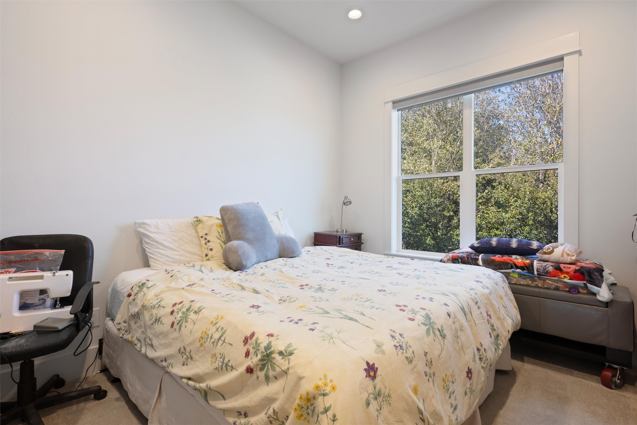 1136 Adele Street Houston, TX 77009 - Photo 25 of 28 a bedroom with a bed and a window