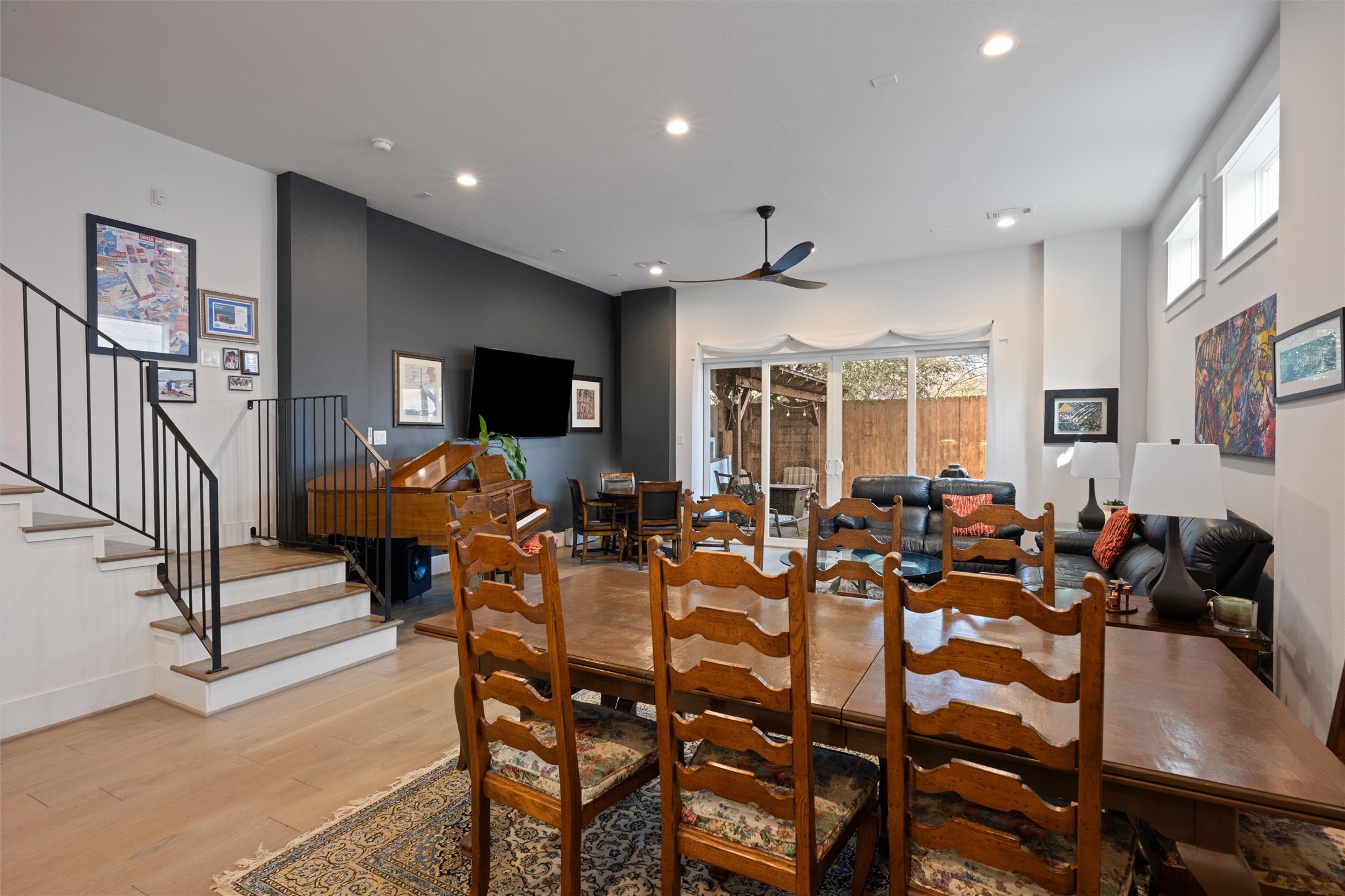 1136 Adele Street Houston, TX 77009 - Photo 10 of 28 a view of a dining room with furniture window and wooden floor
