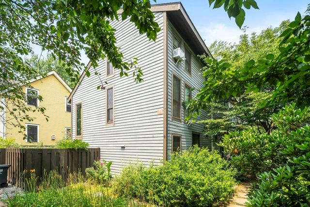 a view of a backyard with plants