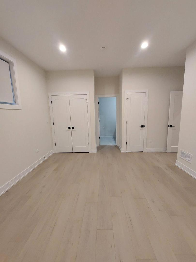 4625 South Michigan Avenue, Unit 2 Chicago, IL 60653 - Photo 8 of 21 a view of an empty room