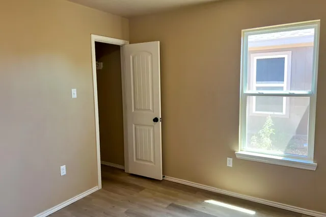 a bathroom with a sink a toilet and bathtub
