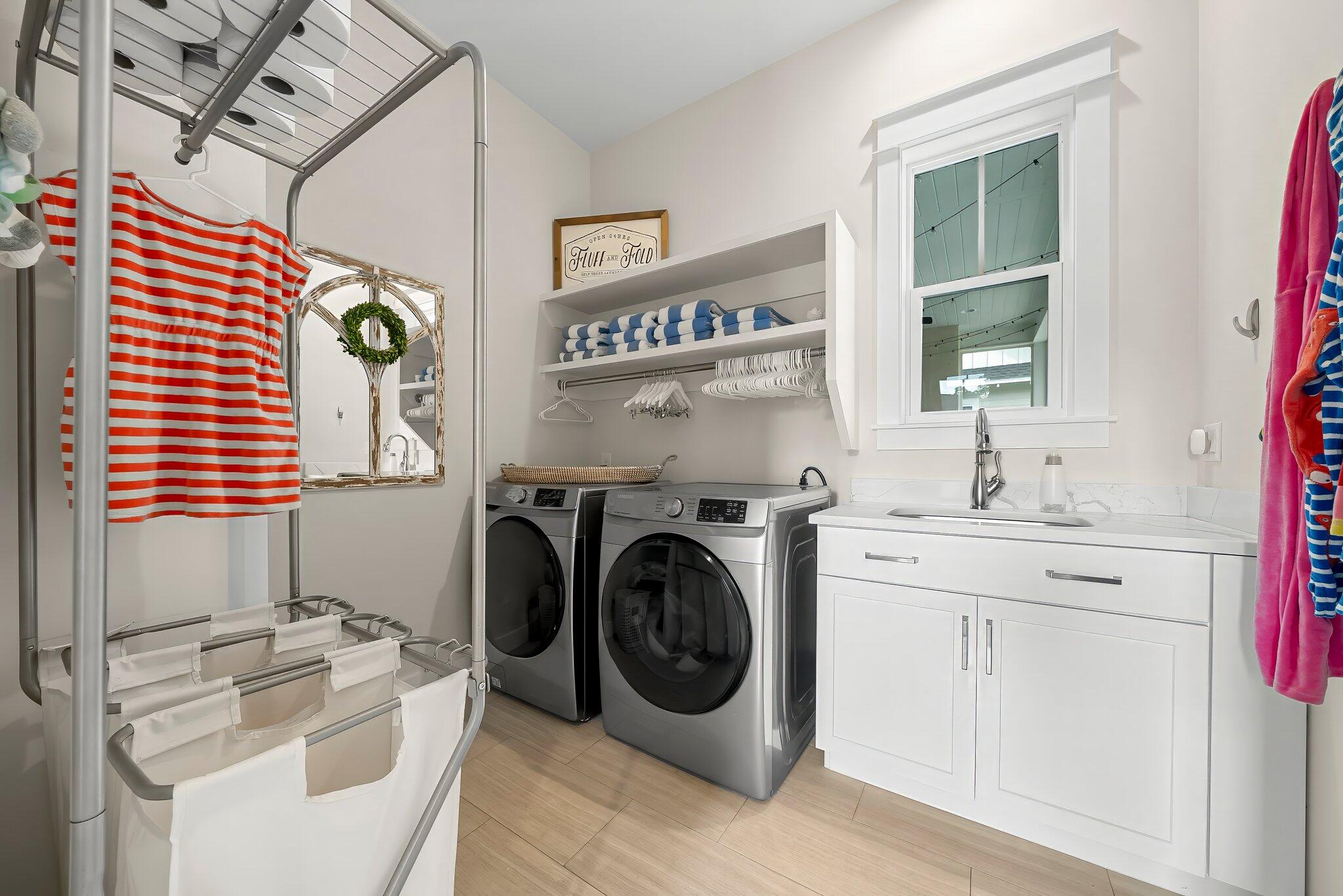 146 Trailhead Drive Inlet Beach, FL 32461 - Photo 21 of 74 a utility room with dryer and washer