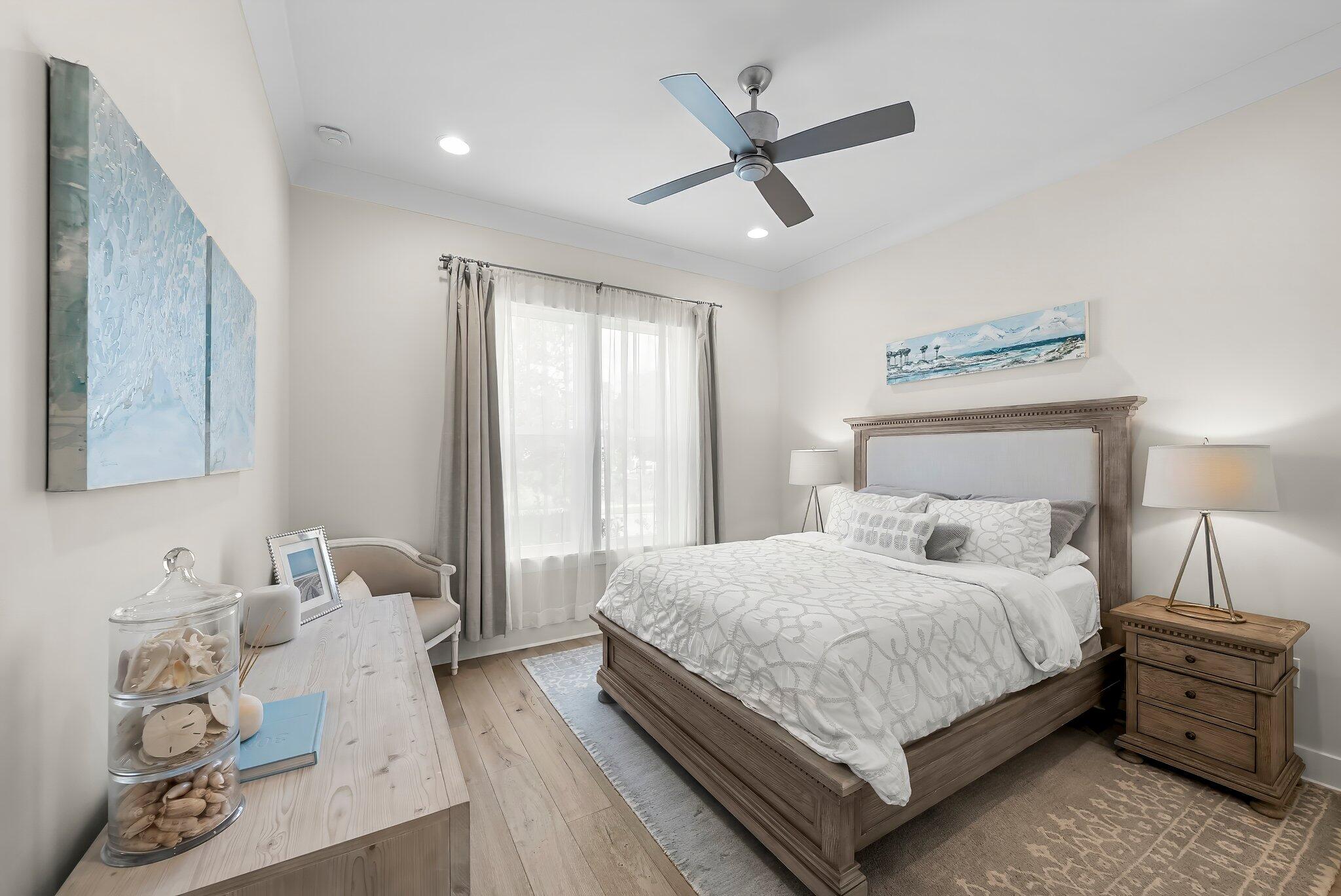 146 Trailhead Drive Inlet Beach, FL 32461 - Photo 23 of 74 a bedroom with a bed and wooden floor
