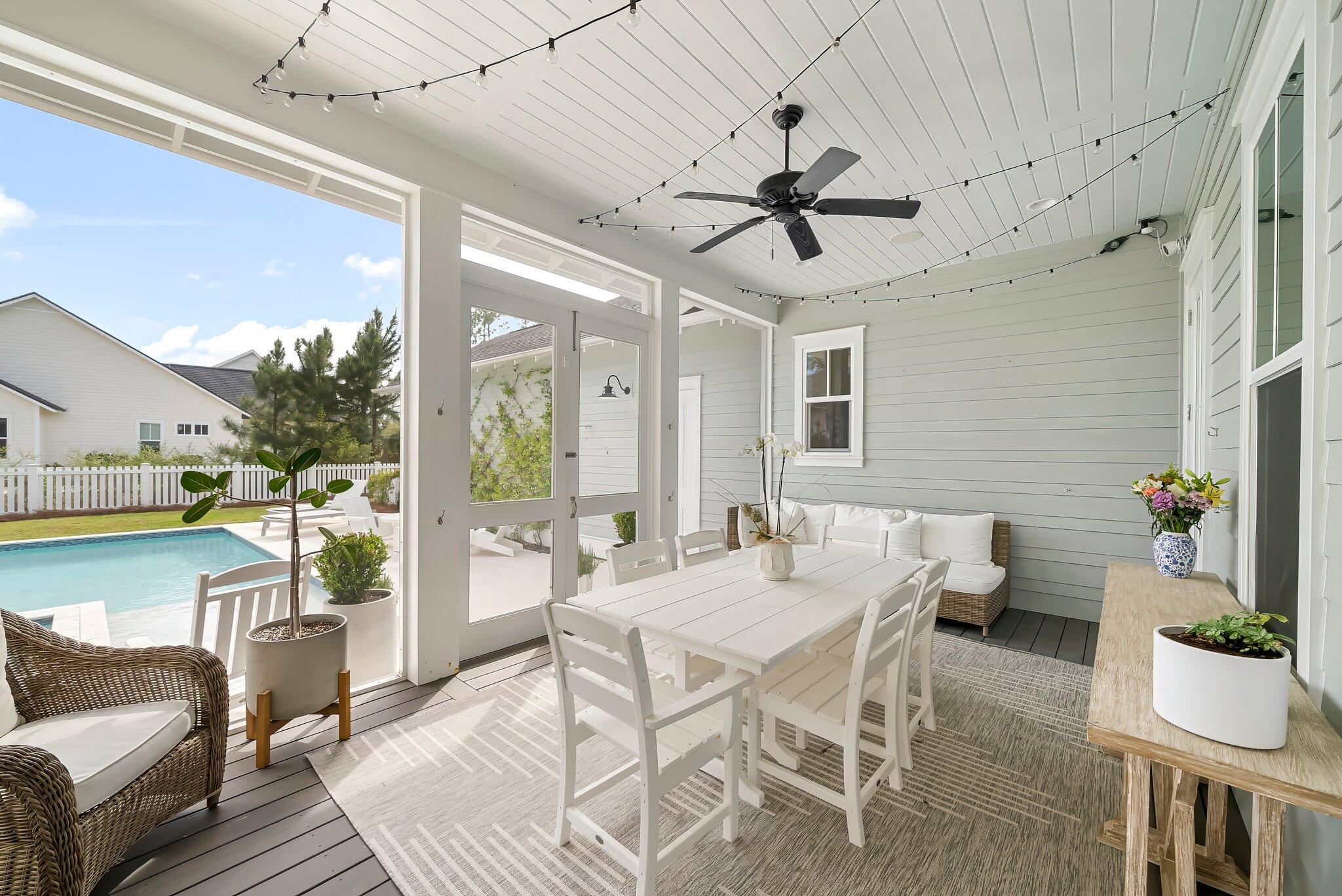 146 Trailhead Drive Inlet Beach, FL 32461 - Photo 28 of 74 a dining room with furniture window and wooden floor