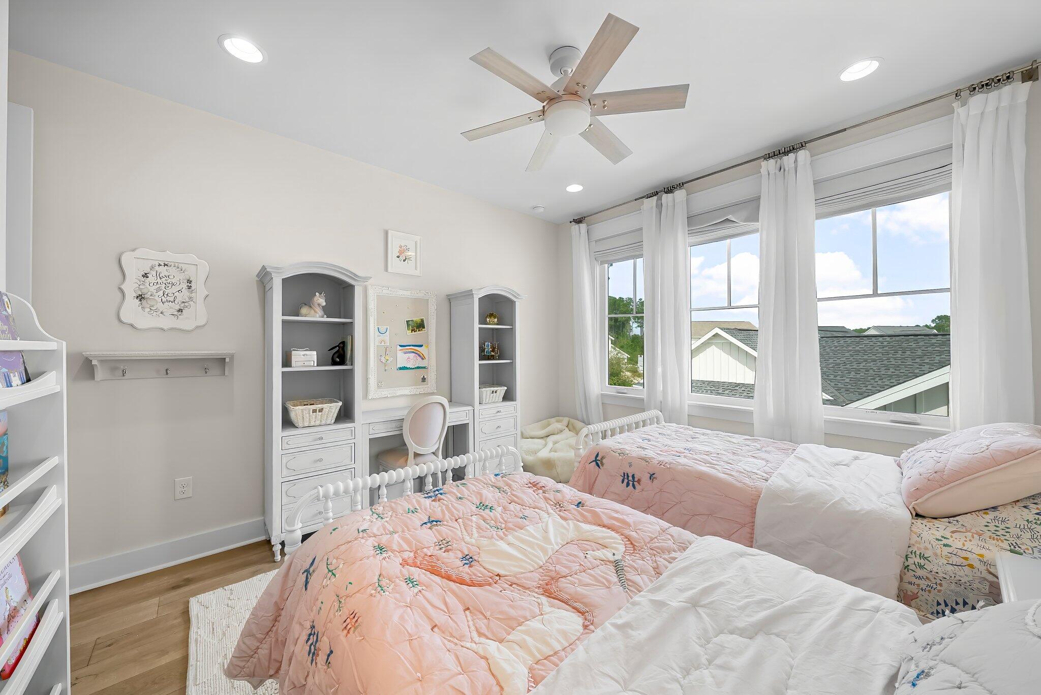 146 Trailhead Drive Inlet Beach, FL 32461 - Photo 31 of 74 a spacious bedroom with a large bed and a large window