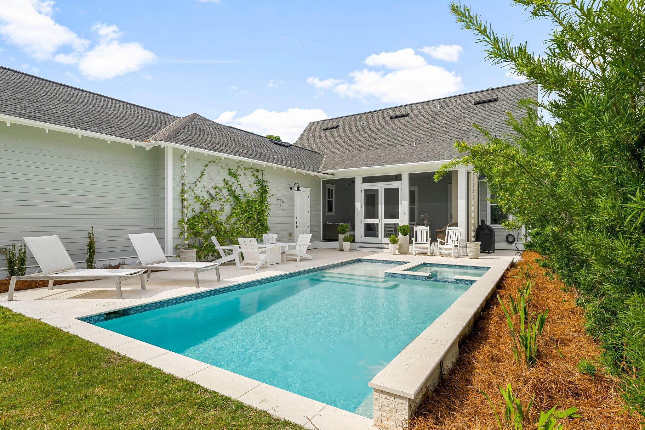 146 Trailhead Drive Inlet Beach, FL 32461 - Photo 46 of 74 a view of a house with swimming pool and sitting area