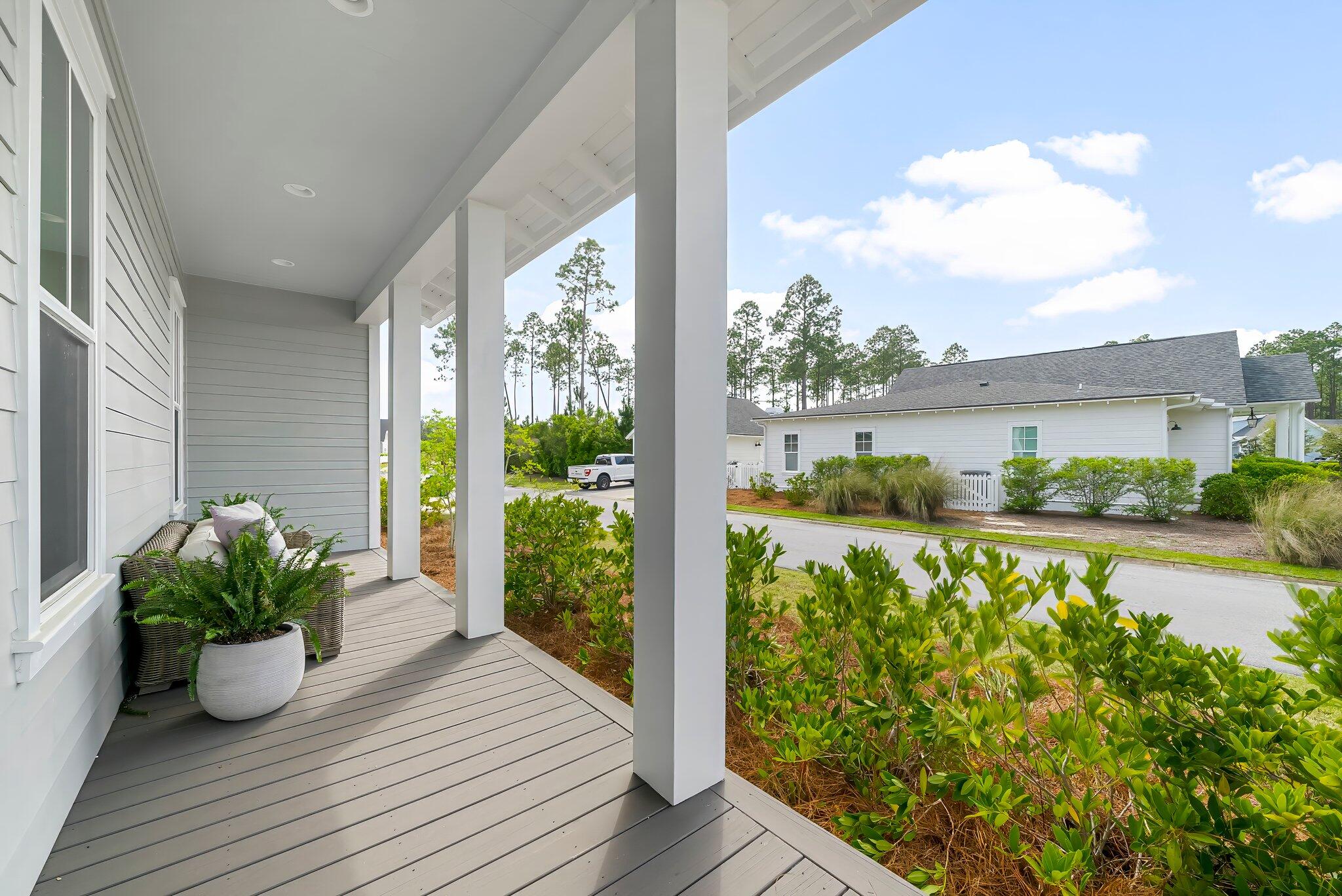 146 Trailhead Drive Inlet Beach, FL 32461 - Photo 5 of 74 a view of a balcony with lake view and a potted plant