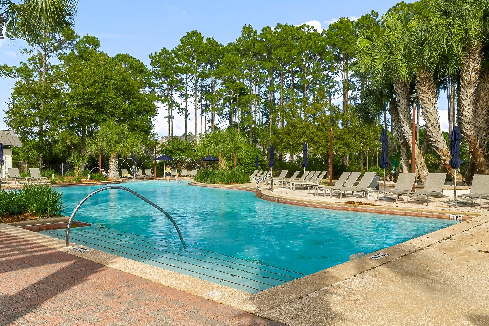 146 Trailhead Drive Inlet Beach, FL 32461 - Photo 53 of 74 a view of a swimming pool with a patio