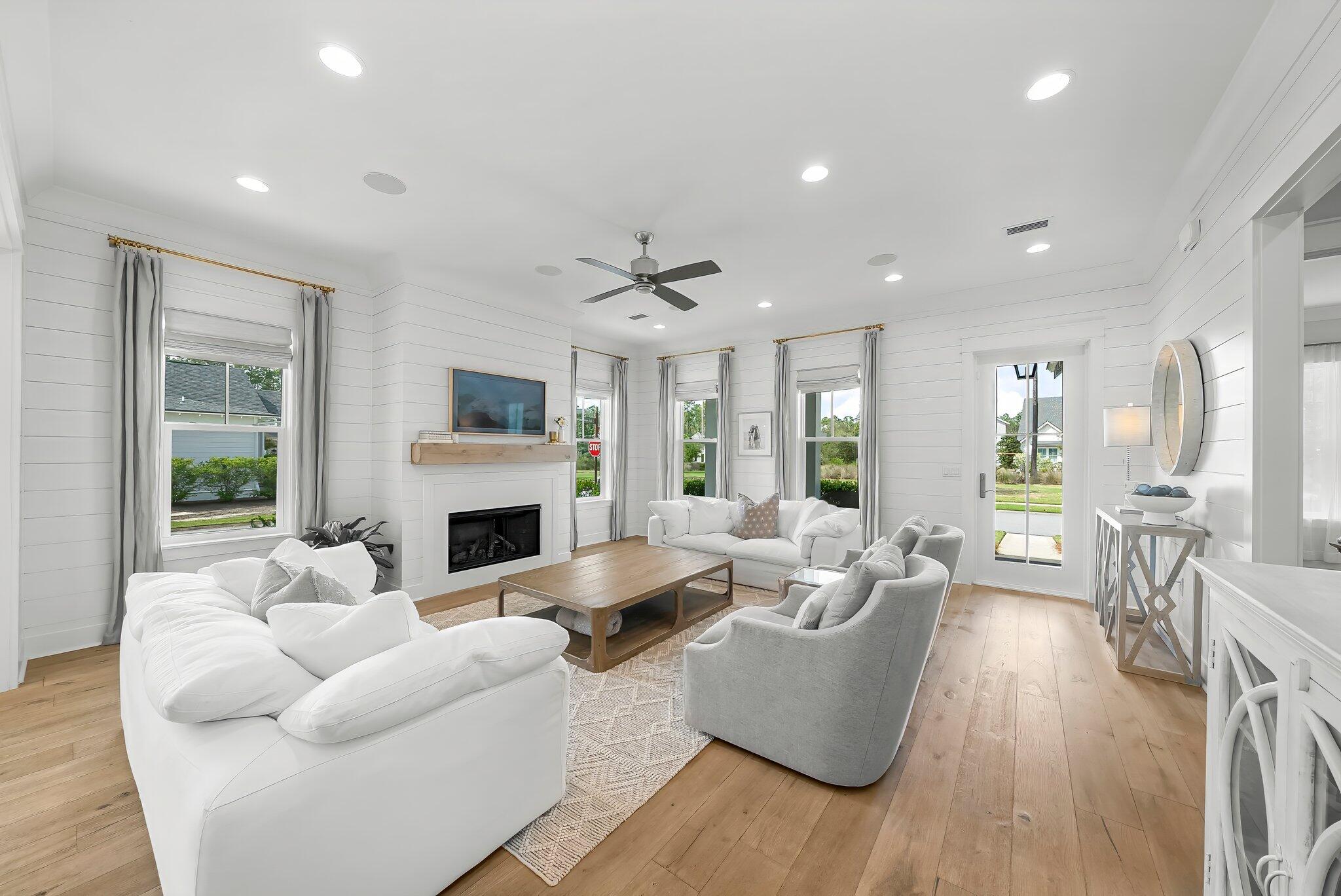 146 Trailhead Drive Inlet Beach, FL 32461 - Photo 8 of 74 a living room with furniture fireplace and a large window