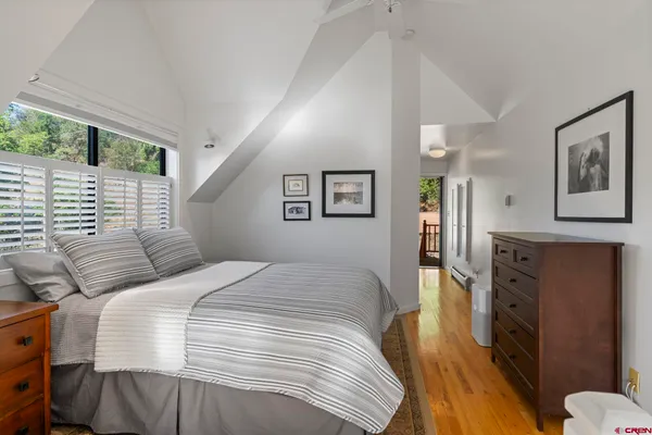 a room with furniture and a large window