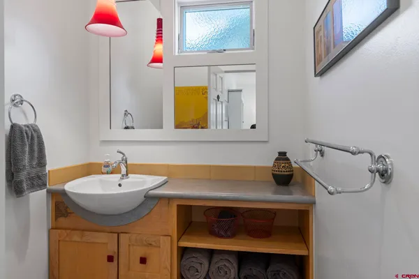 a kitchen with lots of counter top space and appliances