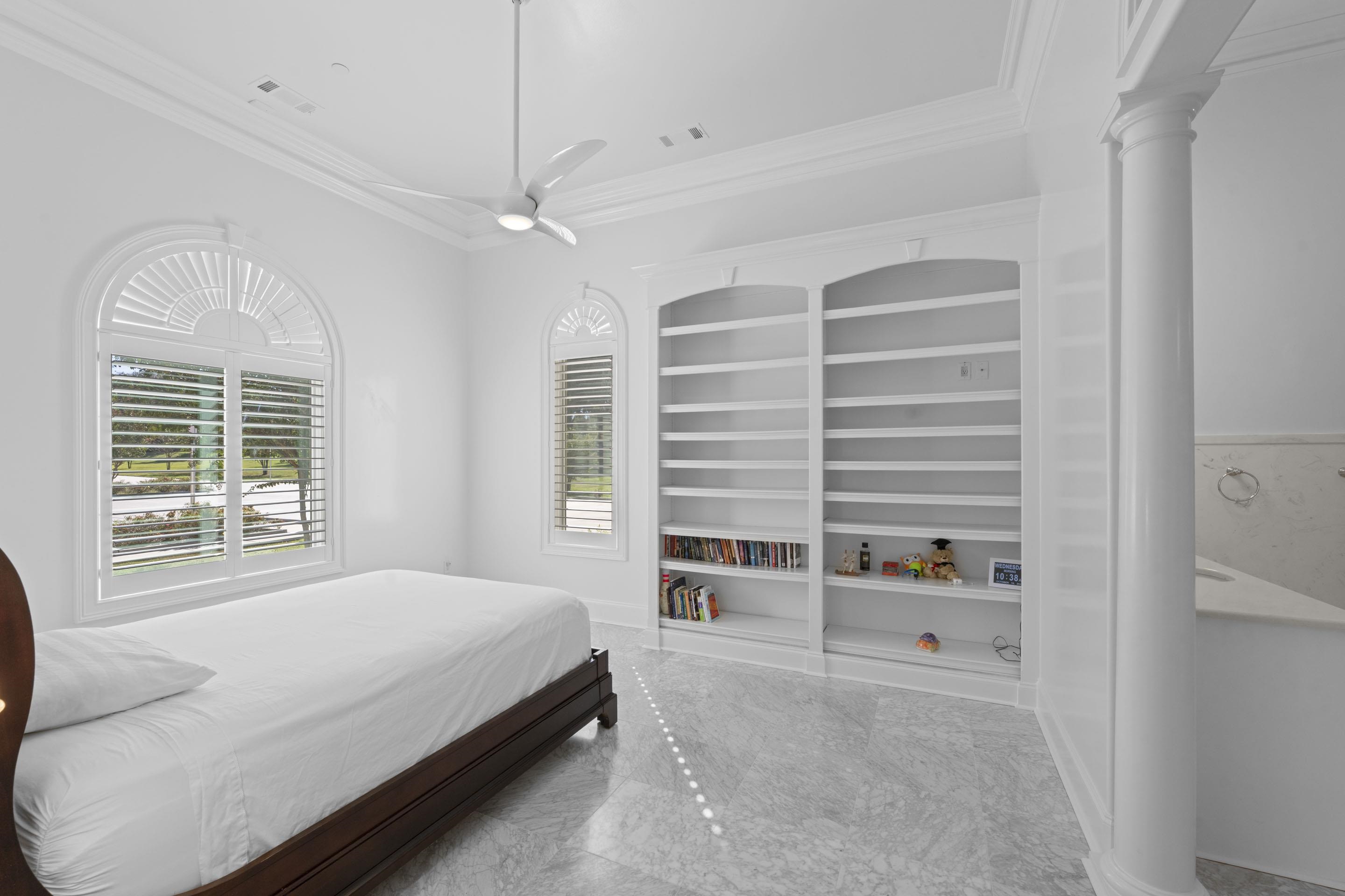 881 Bray Station Road Collierville, TN 38017 - Photo 16 of 40 Bedroom featuring ornamental molding, a ceiling fan, and decorative columns